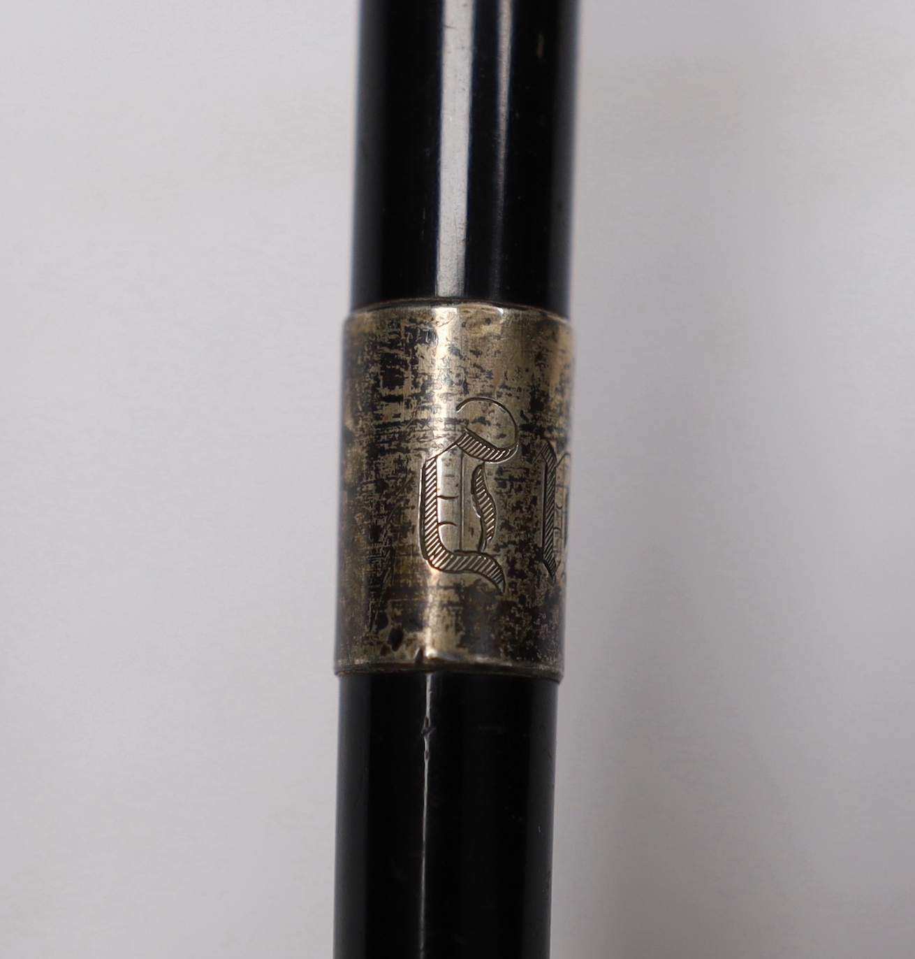 A silver-mounted conductor’s baton, hallmarked Birmingham 1923, 46cm